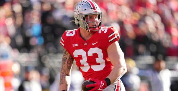 Ohio State Buckeyes defensive end Jack Sawyer celebrates a play during a college football game in the Big Ten.